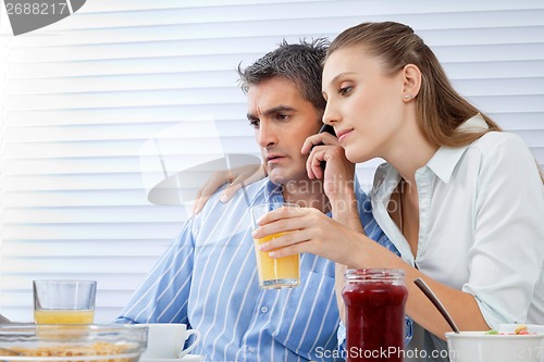 Image of Couple Having Breakfast Together