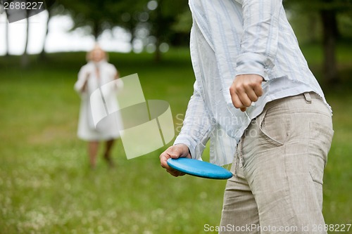 Image of Man Holding Flying Disc