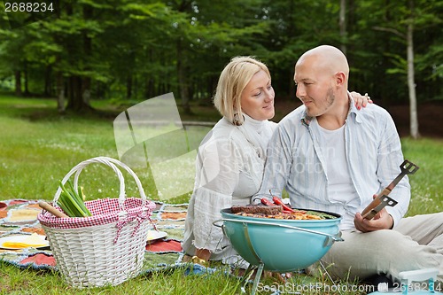 Image of Couple On An Outdoor Picnic