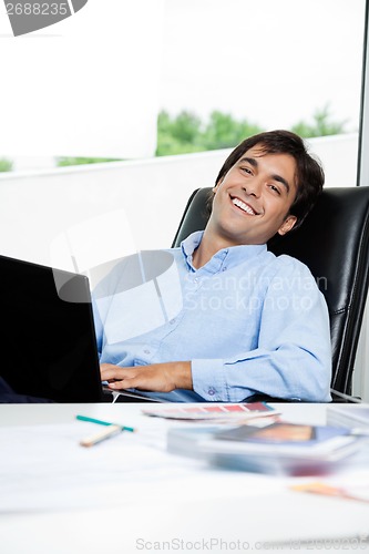 Image of Interior Designer With Laptop