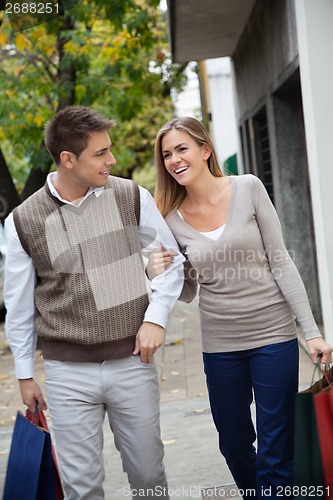 Image of Couple With Shopping Bags