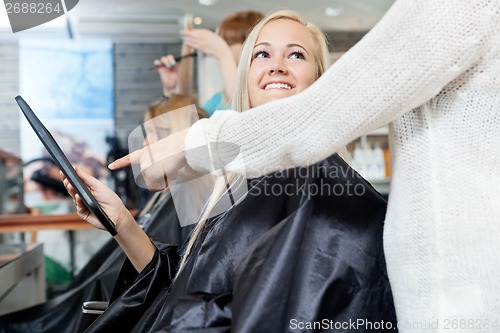 Image of Woman With Digital tablet At Parlor