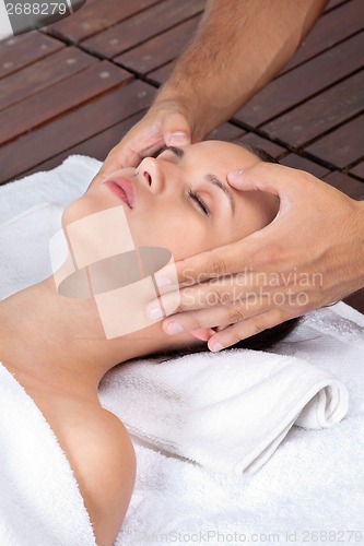 Image of Woman Receiving Head Massage