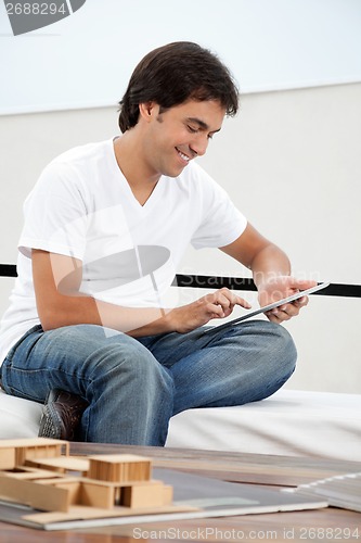 Image of Architect Using Tablet PC