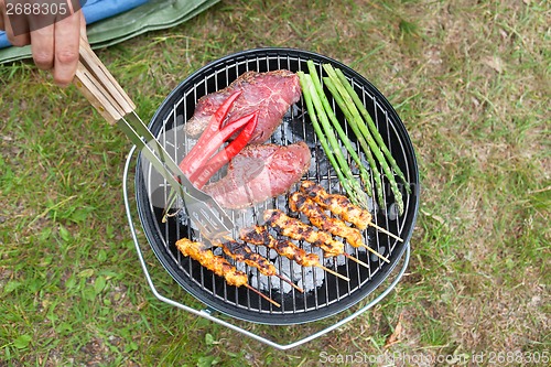 Image of Meat And Veggies Cooking On Barbecue