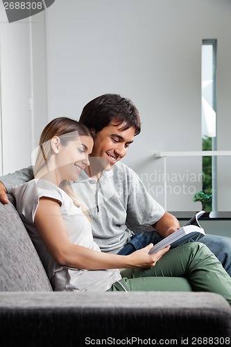 Image of Couple Reading Book