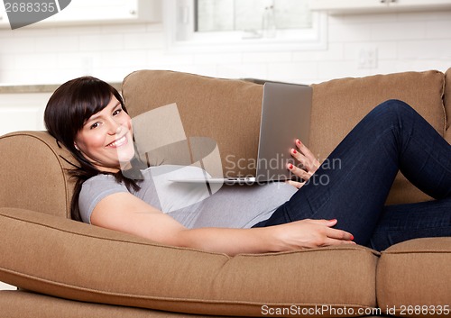 Image of Relaxed Pregnant Woman with Computer