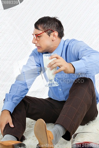Image of Geek Holding Healthy Drink