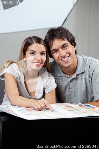 Image of Couple With Color Swatch Chart