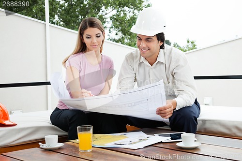 Image of Architect Team Discussin House Plans