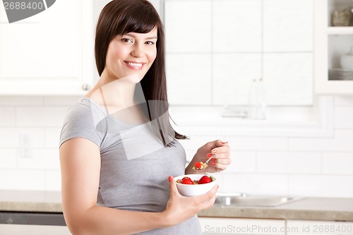 Image of Pregnant Woman Eating Healthy Meal
