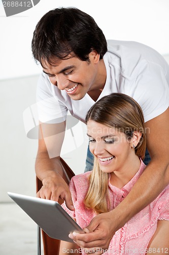 Image of Couple Using Tablet PC