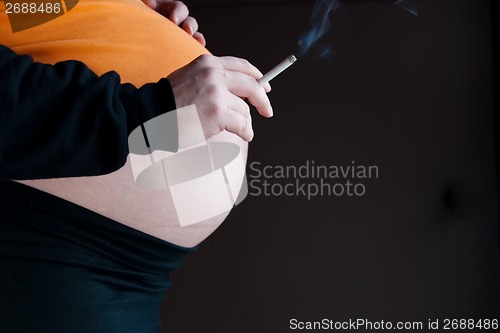 Image of Woman pregnant smoking