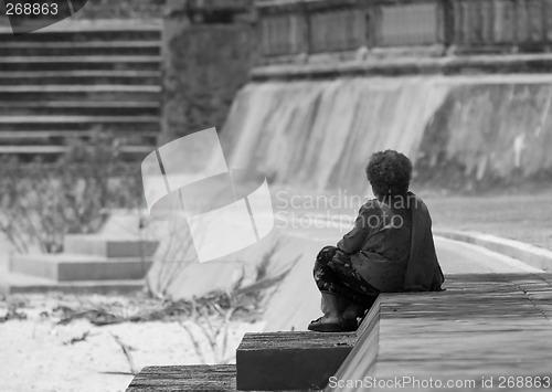 Image of Old woman waiting