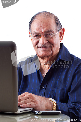 Image of East Indian Man on Computer