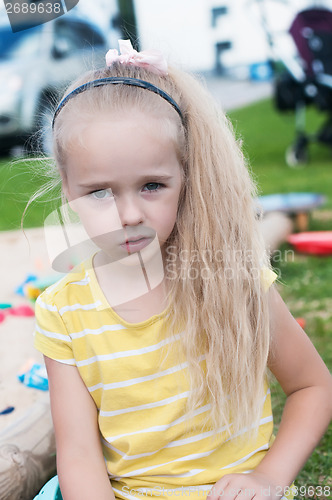 Image of Portrait of beautiful little girlwith long hair