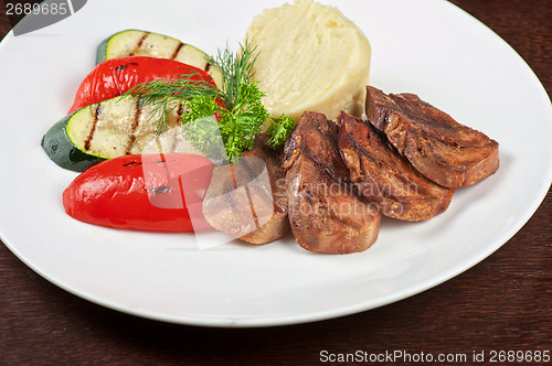Image of tongue with grilled vegetable