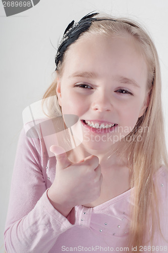 Image of Little girl with thumb up