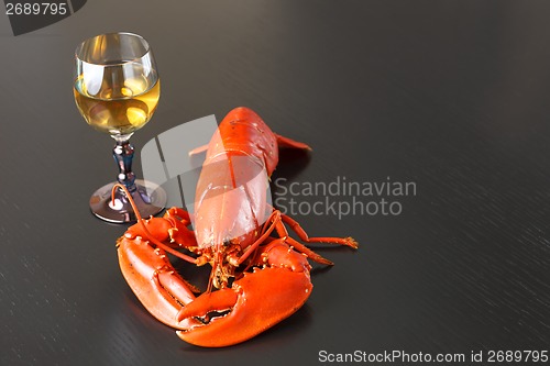 Image of Boiled Atlantic Lobster with glass of white wine