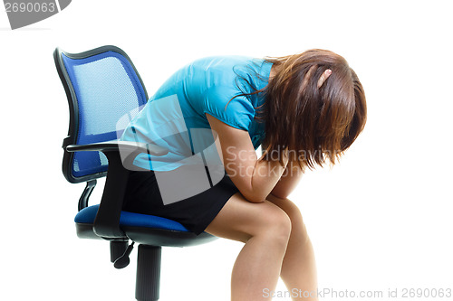 Image of upset and tired girl on a chair on a white background