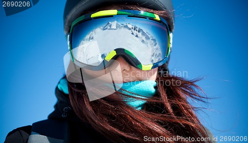 Image of Woman on summit in alps