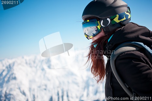 Image of Woman on summit in alps