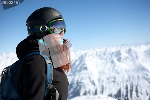 Image of Woman on summit in alps