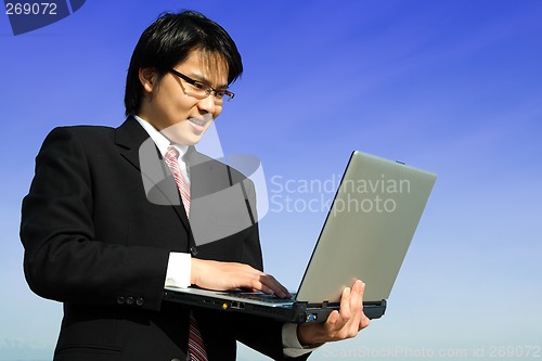 Image of Working businessman