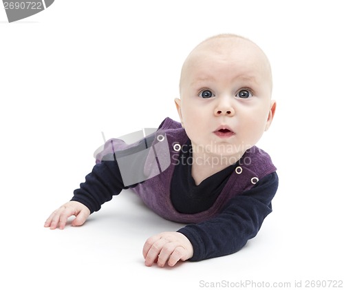 Image of astonished baby on floor