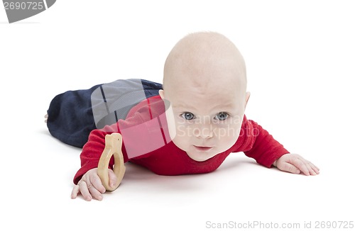 Image of baby on floor, isolated in white background