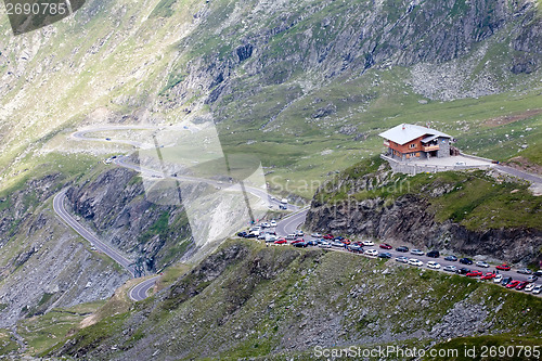 Image of mountain pass road and resort house