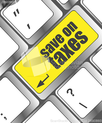 Image of save on taxes word on laptop keyboard key, business concept