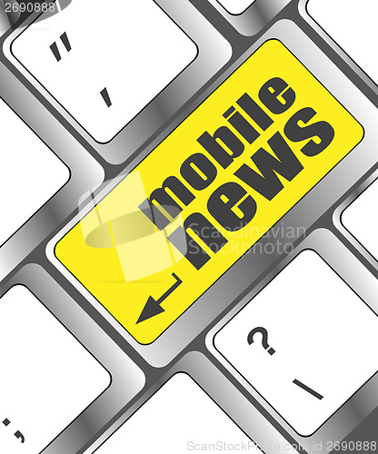 Image of mobile news word on black keyboard and green button