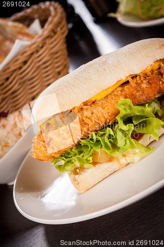 Image of Burger with golden crumbed chicken breast