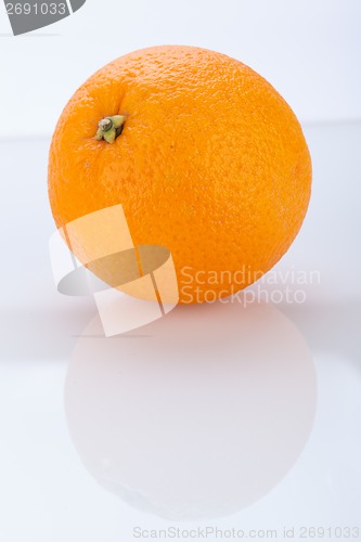 Image of Fresh orange halved to show the pulp