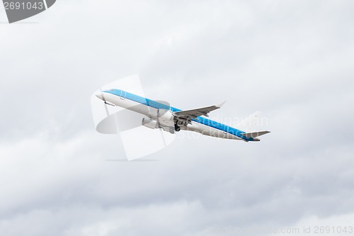 Image of Commercial airliner flying midair after takeoff