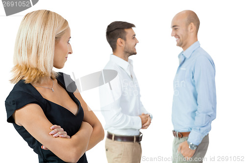 Image of young happy business woman team in background