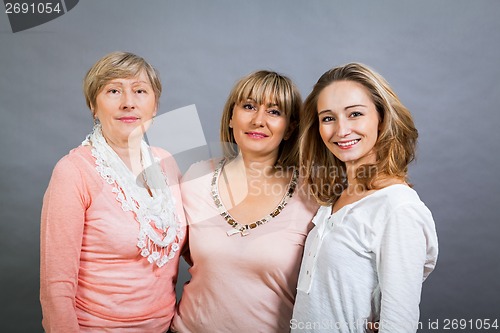 Image of Three generations with a striking resemblance