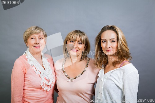 Image of Three generations with a striking resemblance