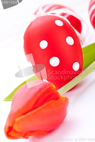 Image of Colourful red Easter still life