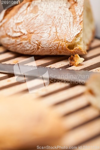 Image of homemade fresh baked bread and knife 