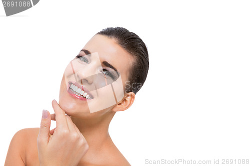 Image of beautiful young woman with perfect skin and soft makeup
