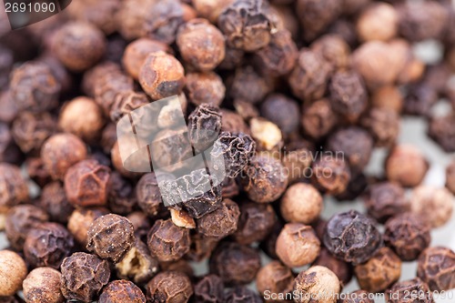 Image of Background of black peppercorns