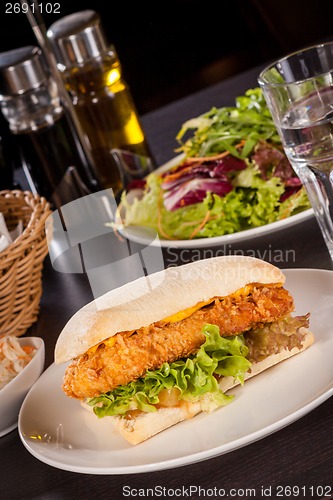 Image of Burger with golden crumbed chicken breast