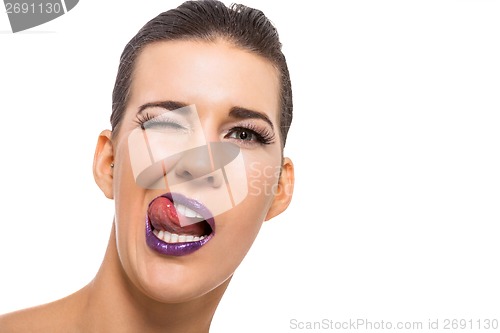 Image of Graceful attractive woman with purple lips and nails