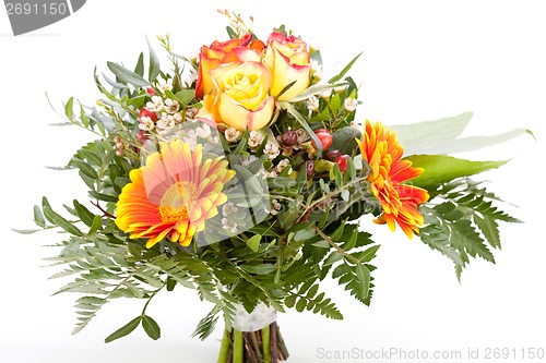 Image of Vivid orange gerbera daisy in a bouquet