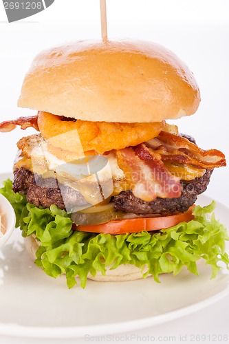 Image of Delicious egg and bacon cheeseburger