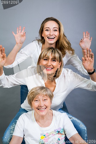 Image of Three generations with a striking resemblance