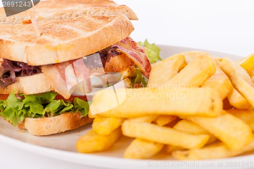 Image of Club sandwich with potato French fries