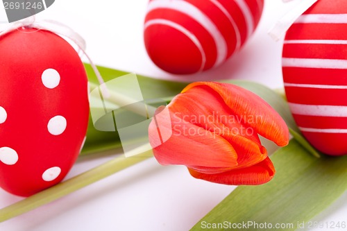 Image of Colourful red Easter still life